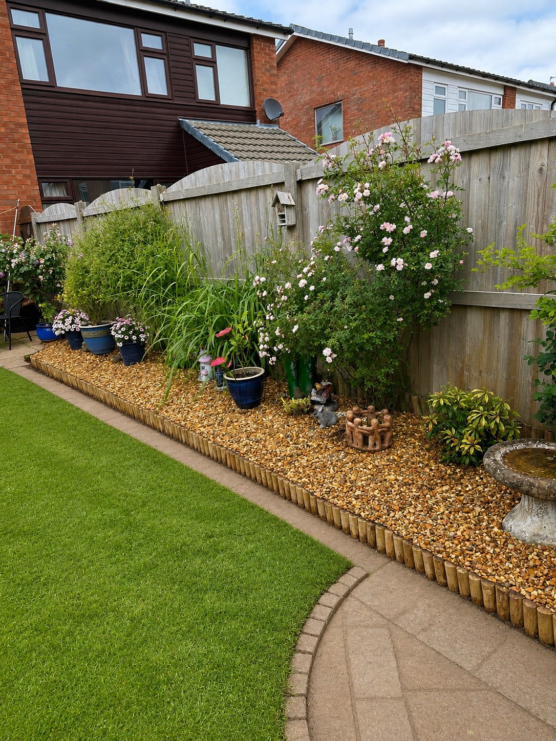 Vibrant garden border with hydrangeas and golden gravel